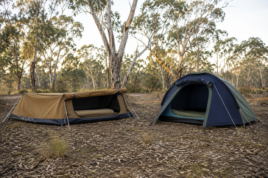 Canvas swag and two-person tent pitched beside each other in the Australian bush