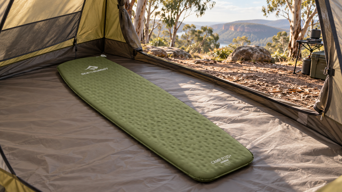 Cypress Sea to Summit Camp Plus Regular camping mat inside an open tent overlooking eucalyptus bushland.